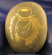 mahalo carved on rock
